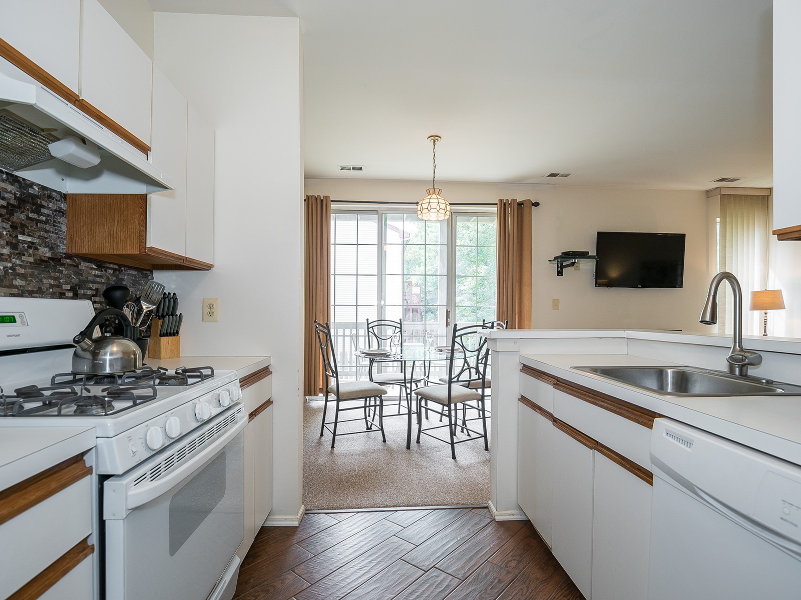 Furnished Apartment South Brunswick 3361 kitchen with all included appliances and view into dining area