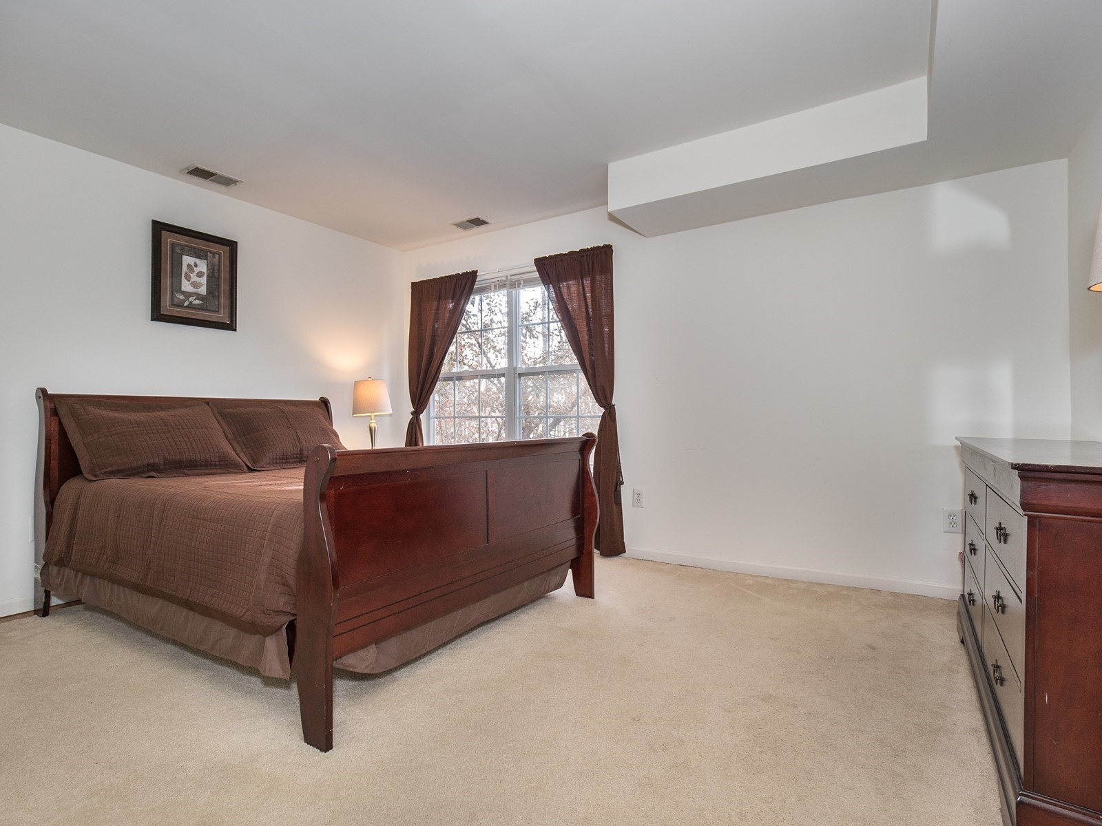 South Plainfield 713 Short Term Lease master bedroom with large bed and nightstand