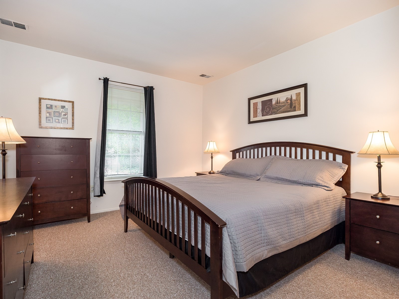 Furnished Apartment South Brunswick 3361 with king sized bed, two dressers and two nightstands
