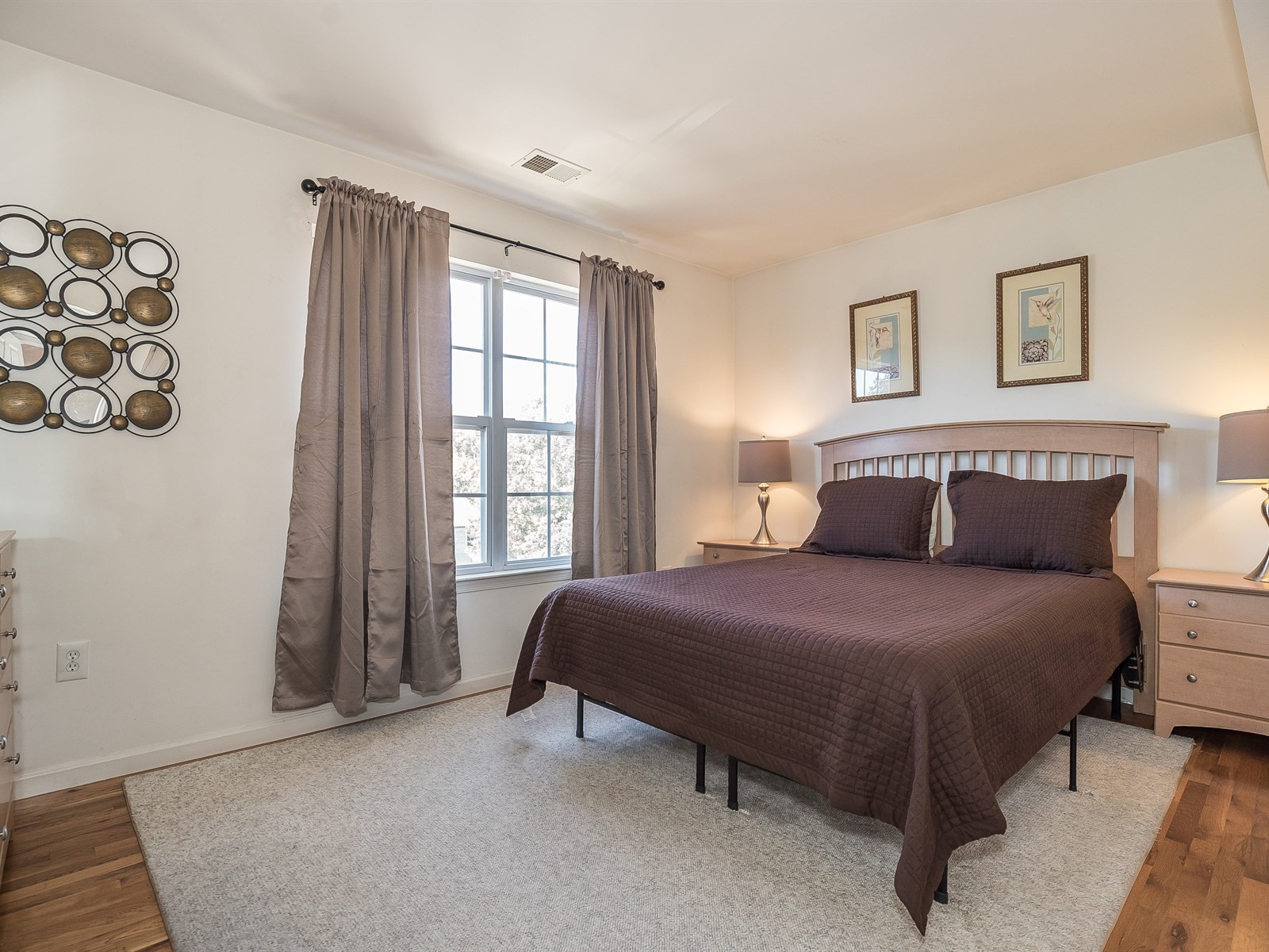 Furnished Apartment South Brunswick 631 master bedroom with king sized bed and nightstands